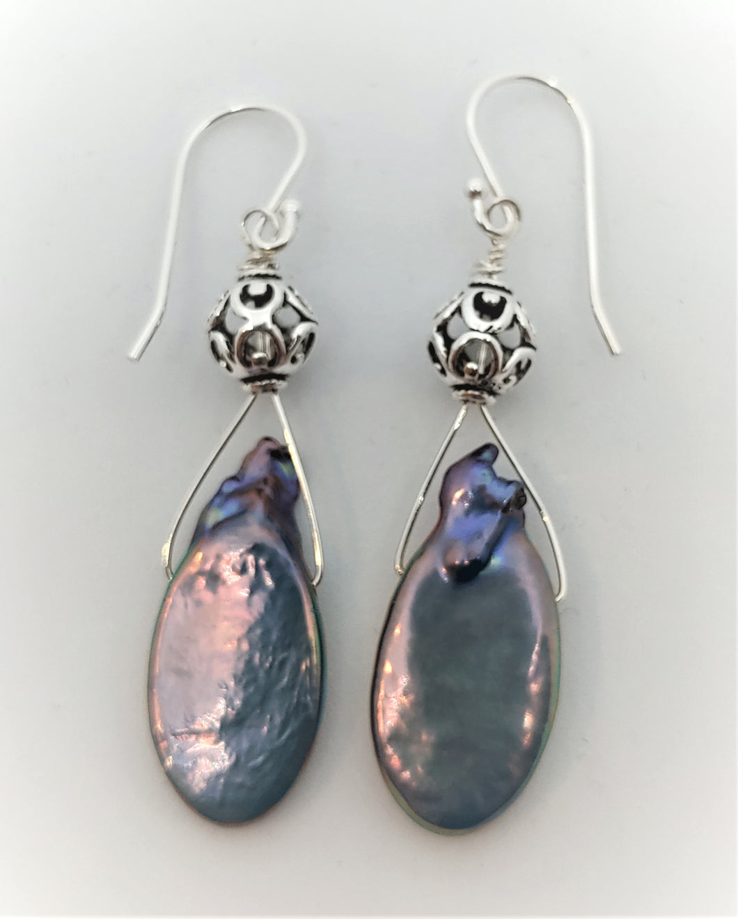 Drop peacock baroque earrings.