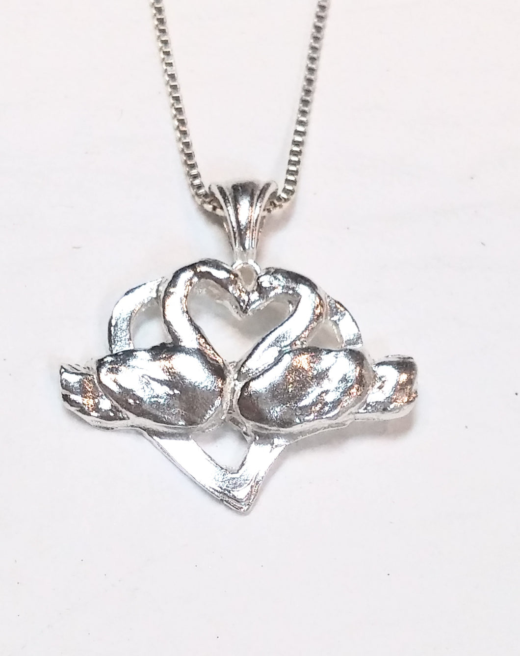 Kissing Swans pendant necklace